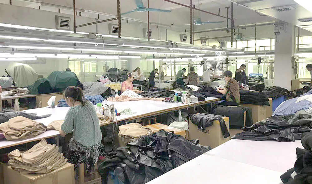 Garment workers producing custom clothing at the Boxiang factory
