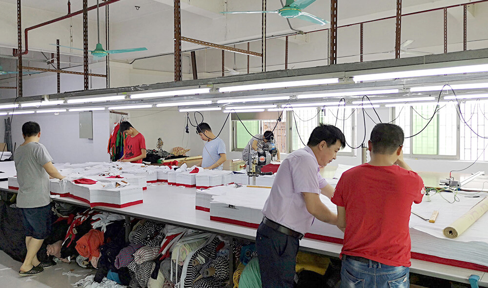 Fabric cutting process for custom apparel production